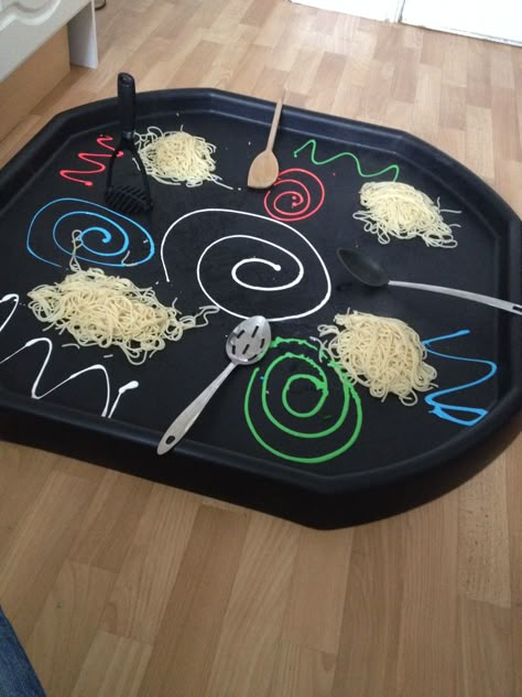 Spaghetti, paint and utensils for messy play in builders tray. Great fun. Bonfire Night Activities, Messy Play Activities, Weird Videos, Diwali Activities, Tuff Spot, Eyfs Activities, Nursery Activities, Tuff Tray, Education Activities