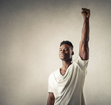 Photo victorious man raising his arm | Premium Photo #Freepik #photo #african-man #happy-african #men-fashion #body-positive Anatomy Reference, Premium Photo, Pose Reference, Victorious, Anatomy, Stock Photos, Clothes