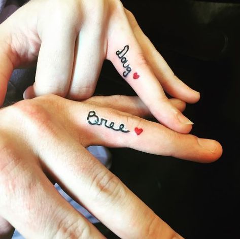 50+ Matching Wedding Ring Tattoos For Couples (2020) Wedding Ring Tattoos For Couples, Ring Tattoos For Couples, Tattoo On Ring Finger, Couple Ring Finger Tattoos, Wedding Ring Finger Tattoos, Wedding Ring Tattoos, Finger Tattoos For Couples, Ring Tattoo Designs, Couple Tattoos Unique Meaningful