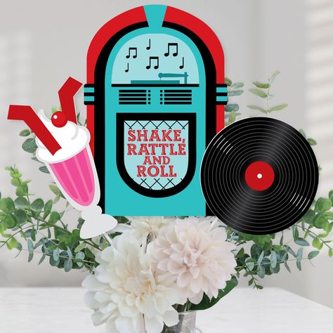 PRICES MAY VARY. 50’s Sock Hop Centerpiece Sticks INCLUDES 15 rock n roll table toppers in three different shapes, 15 table topper sticksand stickers for easy assembly. Sock hop party table decorations are perfect for a 1950s party. 50’s Sock Hop Centerpiece Sticks SIZE five jukebox table toppers, 7.25” wide x 10.75” tall; five malt / shake table toppers, 4.25” wide x 8” tall; and five record table toppers, 6” wide x 6” tall. The unique design and variety of pieces makes this table decoration ki Grease Table Decorations, Record Centerpieces Ideas, Grease Centerpiece Table Decorations, Sock Hop Party Ideas, 50s Sock Hop Decorations, Sock Hop Table Decorations, Sock Hop Centerpieces Table Decorations, Sock Hop Decorations, 50s Party Decorations