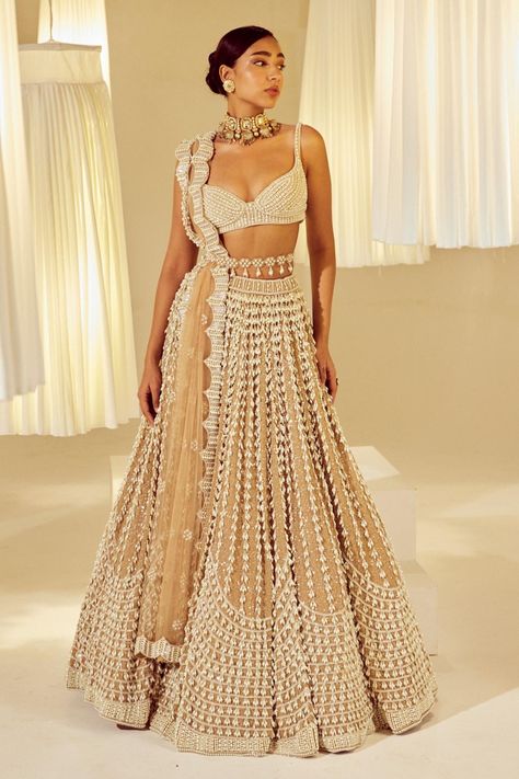 Beige pearl embellished lehenga set for women Lehenga With Pearls, Pearl Blouse Designs, Pearl Lehenga, Beige Lehenga, Vani Vats, Cancan Lehenga, Simple Lehenga, Indian Outfits Lehenga, Lehenga Designs Simple