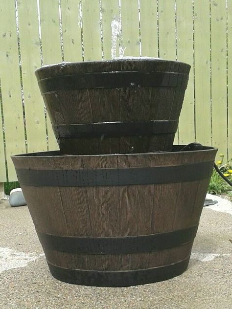 Make a DIY Recirculating Fountain. A great Spring or Summer DIY project. Spruce up your home and enjoy the soothing sounds of water this Summer! Give your backyard a whole new spa vibe with this fabulous diy fountain on a budget. #diy | fountains | gardens | diy fountains | backyards | backyard | budget | summer Backyard Waterfalls, Barrel Fountain, Diy Solar Fountain, Fountain Ideas, Diy Water Feature, Diy Water Fountain, Outdoor Fountains, Summer Diy Projects, Diy Garden Fountains