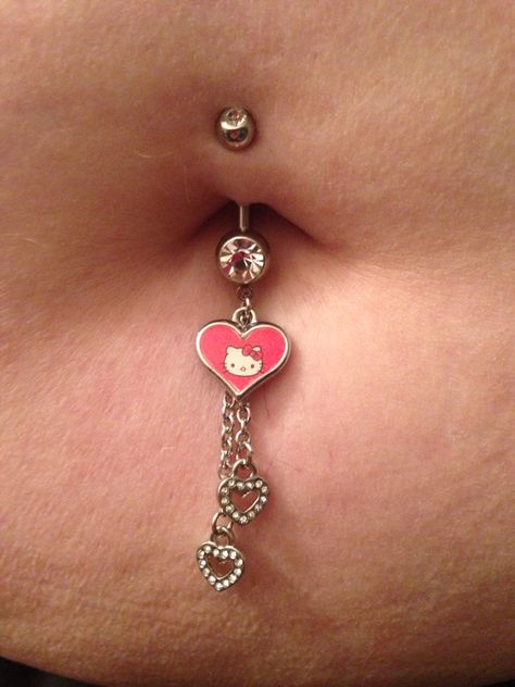 Hello Kitty belly button ring Belly Button Piercing Hello Kitty, Hello Kitty Belly Button Piercing, Hello Kitty Belly Piercing, Hello Kitty Nose Piercing, Hello Kitty Piercing, Stomach Piercings, Dream Piercings, Sanrio Core, Cute Belly Rings