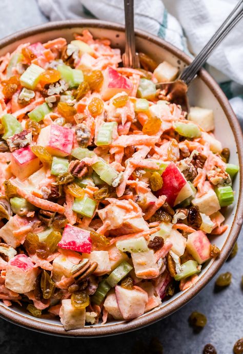 overhead photo of Carrot Apple Salad with Yogurt Dressing in serving bowl with spoons. Carrot Salad Dressing Recipe, Carrot Salad Dressing, Apple Carrot Salad, Carrot Apple Salad, Apple Salad Dressing, Zucchini Ribbon Salad, Vegetarian Easter, Apple Yogurt, Apple Salad Recipes