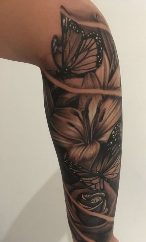 Floral Tattoo Design Black Women, Garden Tattoos For Black Women, Lily Half Sleeve Tattoo For Women, Female Tattoo Sleeve Black Women, Shaded Sleeve Tattoo Women, Shoulder Half Sleeve Tattoo For Women Black, Sleeve On Black Women, Tattoo Cover Up Ideas For Black Women, Flower Sleeve Tattoos For Women Black