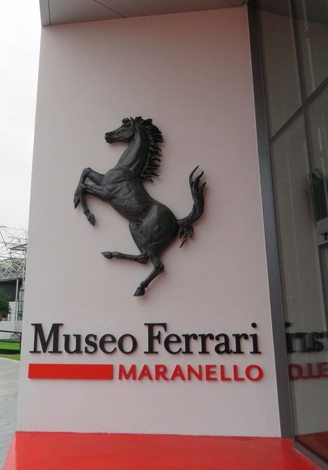 Prancing horse heralds the entrance to the Ferrari Museum. Ferrari Museum Italy, Ferrari Horse, Ferrari Maranello, Ferrari Museum, Forza Ferrari, Prancing Horse, Pray For Love, 2024 Goals, Ferrari Enzo