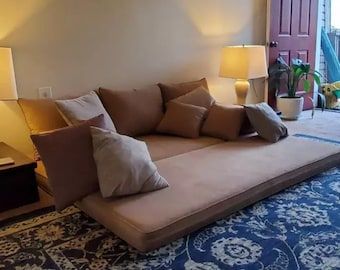 Low Table For Sitting On The Floor, Arab Floor Seating, Boho Floor Seating Living Room, Low Sitting Living Room Ideas, Low Floor Seating Living Rooms, Arabic Floor Sofa, Low Living Room Seating, Living Room Without Couch, Low Furniture Living Room