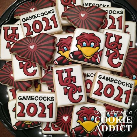 Lookout @uofsc here he comes! #uofsc #gamecocks #gamecocknation #universityofsouthcarolina #uscgamecocks #forevertothee #decoratedcookies #sugarcookies #durhamcookies #trianglecookies #edibleart #acookieaddict Gamecock Cookies Decorated, Pharmacy Graduation, Gamecock Nation, Usc Gamecocks, University Of South Carolina, College Logo, South Carolina Gamecocks, Edible Art, Grad Party