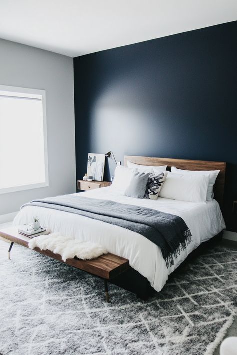 Unleash your creativity with these 25 navy blue and grey bedroom decor ideas. Explore a variety of styles, from traditional to modern, and find inspiration for incorporating these versatile hues into your own space. Navy Blue Master Bedrooms Decor, Blue And Grey Walls, Navy Wall Bedroom, Blue And Grey Bedroom Decor, Dark Blue Accent Wall Bedroom, Navy Blue Accent Wall Bedroom, Navy And Grey Bedroom, Grey And Blue Bedroom, Navy Blue And Grey Bedroom