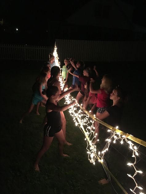 Lights on volleyball net Volleyball Net With Lights, Light Up Volleyball Net, Glow Volleyball Party, Volleyball Backyard, Summer Volleyball, Swiftie Birthday, Summer Backyard Parties, Volleyball Party, Teenage Birthday Party