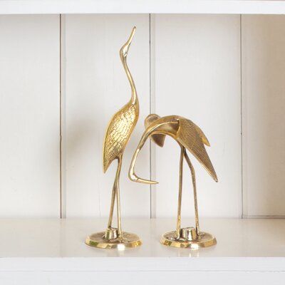 Bay Isle Home™ These two crane objects look great on an accent table or bookshelf. | Bay Isle Home™ 2 Piece Ameer Crane Birds Figurine Set, Metal in Gold, Size Small - 4" - 7" H Large - Over 12" H | Wayfair | Home Decor Aw 23, Live Beautiful, Crane Bird, Colonial Decor, Entryway Wall, Bird Statues, Balloon Dog, Blue Heron, Wall Arts