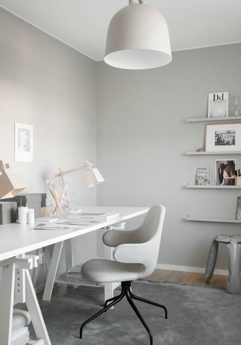 Light grey apartment with pale wood. Stunning work space in light grey.    DIY idea - shelves painted the same colour as the wall  #greyinteriors #diy Light Gray Bedroom, Gray Bedroom Walls, Space Saving Desk, Grey Office, Pale Wood, Light Grey Walls, Grey Desk, Home Office Lighting, Scandinavian Interior Design