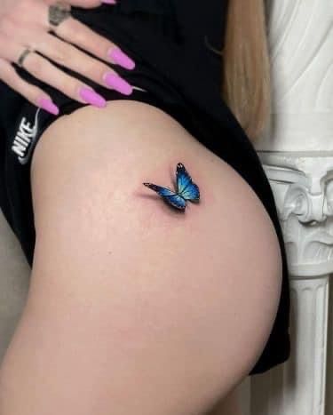 Two Butterflies Tattoo Design, Butterfly Tattoo Ideas For Women, Blue Flower Tattoos, Blue Ink Tattoos, Side Hip Tattoos, Mirror Tattoos, Butterfly Tattoo Ideas, 3d Butterfly Tattoo, Blue Butterfly Tattoo