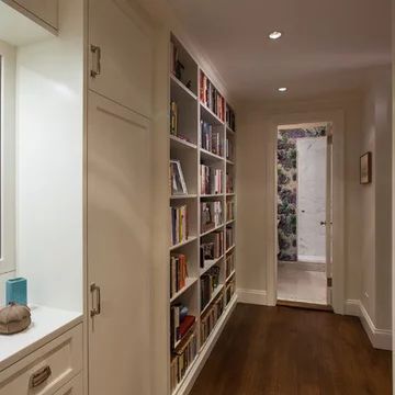 Hallway Library | Houzz Library In Hallway, Book Hallway, Hallway Library, Hallway Remodel, Dark Stained Wood Floors, Country Hallway, Beautiful French Doors, Oceanfront Cottage, Colorful Playroom