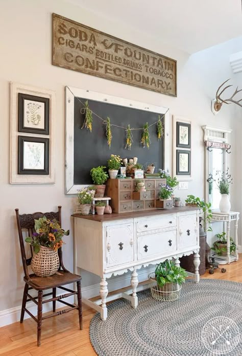 garden theme console display, chalkboard, flowers Entryway Decor Vintage, Vintage Style Dining Room, Vintage Entryway Ideas, Farmhouse Foyer Entryway, Rustic Entryway Ideas, Farmhouse Entryway Ideas, Rustic Farmhouse Entryway, Dining Room Wall Decor Ideas, Farmhouse Entryway