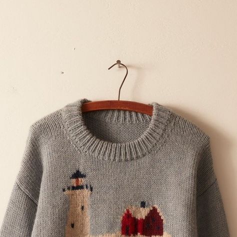 BODE on Instagram: "Our Highland Lighthouse Sweater is inspired by a hand knit sweater from the 1980s. The reference sweater was knit by a Truro, Massachusetts resident to benefit the preservation of a local arts center. This sweater is made on hand looms at a woman-owned and operated factory in Peru. The intarsia landscape sweater design is by Lynne & Douglas Barr, originally inspired by The Nubble Lighthouse. ​​​​​​​​ Also available in children's sizes." Lighthouse Sweater, Truro Massachusetts, Landscape Sweater, Nubble Lighthouse, Intarsia Sweater, Hand Knit Sweater, Hand Looms, Truro, Arts Center