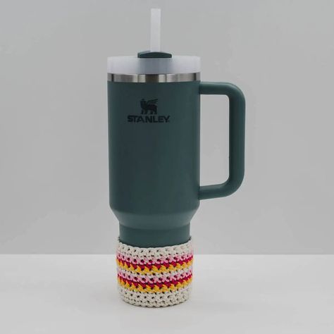 "The Stanley Quencher Tumblers are already remarkable, but when you add a custom-made crochet cozy, holder, or sleeve, they become truly exceptional. The Striped Crochet Stanley Cup Boot pattern is a creative way to personalize your Stanley Quencher, ensuring it’s uniquely yours.  All you need is some extra cotton yarn and a bit of free time to easily create this charming accessory.  Just grab your crochet hook and yarn, and begin adding a unique flair to your Stanley cup that will surely Crochet Tumbler Holder Free Pattern, Crochet Stanley Cup Cozy, Stanley Cup Crochet, Crochet Stanley Cup Holder Free Pattern, Stanley Crochet Holder, Crochet Stanley Cup Holder, Crochet Tumbler Holder Pattern, Stanley Cup Crochet Holder, Religious Christmas Crafts