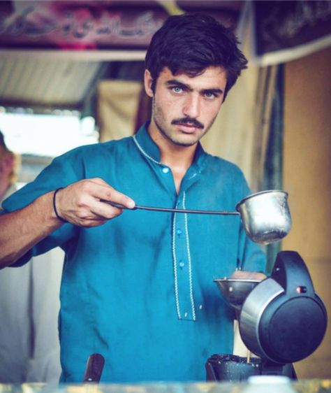 Arshad Khan, 18, is a tea seller at Islamabad's Sunday Bazaar, photographed by Javeria Ali in a picture posted on 14 October, 2016 Chai Wala, Rugged Look, Hot Tea, South Asia, Instagram Foto, People Around The World, Blue Eyes, Nikon, Pretty People