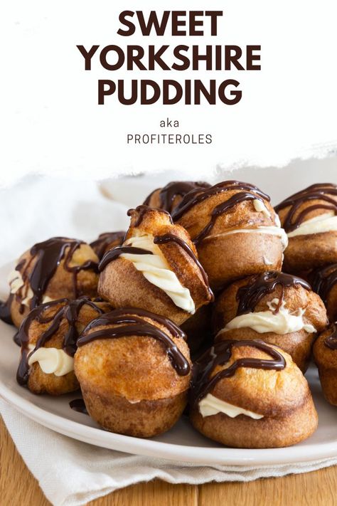 Deliciously scrummy Yorkshire pudding dessert bursting with whipped cream and drizzled with dark chocolate. An irresistible, delightful treat that will sweeten up any party. Sweet Yorkshire Pudding, Yorkshire Pudding Dessert, Profiteroles Recipe, Pudding Desserts Recipes, Savoury Treats, English Recipes, Yorkshire Pudding Recipes, Yorkshire Puddings, Pudding Dessert