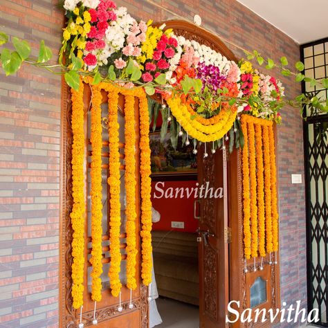 Door Decorations for Pellikoduku Ceremony👸🏻 Designed and styled by @sanvithas 📞💬 7997458082 #wedding #indianwedding #southindianwedding #teluguwedding #royalwedding #pellikuthuru #pellikoduku #decor #pellikodukufunction #door #decorations #floraldecor #decorativeleaves #marigolds #ornamentalflowers #orchids #homedecor #doordecoration #weddingday #weddingblog #weddingphotography #client #stories#decorbysanvithas #weddingdetails #eventstyling #instapic #hyderabad #eventplanner #sanvithas Main Door Decoration Ideas Indian, Main Door Flower Decoration Indian, Decoration For Indian Wedding, Pellikoduku Decor, Pelli Decoration, Wedding Door Decorations, Door Flower Decoration, Wedding Doors, House Warming Invitations