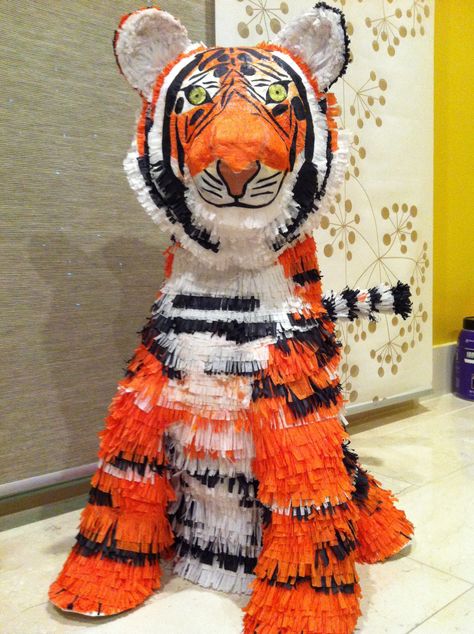 Oscar the tiger. Pinata...Cardboard, tissue paper, and lots of time. Made this for my daughter's birthday. She loves tigers. Loved making it. Tiger Pinata, Tiger Birthday Party Ideas, Pinata Ideas, Tiger Party, Tiger Statue, Tiger Birthday Party, Homecoming Floats, Projects School, Tiger Birthday