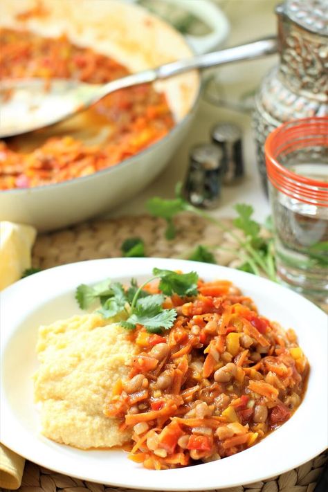 Chakalaka is a lightly curried vegetable stew. It's quick to make and loaded with flavor, served with Pap, a simple cornmeal porridge. (Vegan & gluten free) Chakalaka Recipe, Pap Recipe, Cornmeal Porridge, Lesotho Africa, South African Dishes, Buttered Toast, Peanut Stew, African Cooking, Stewed Potatoes