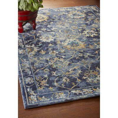 Step up your style game with this stunning area rug. Power-loomed in Turkey using 100% polypropylene, this piece offers both durability and comfort. The classic design features rich, bold color hues, creating a statement in any room. The cotton backing provides added comfort while the luxurious look is perfect for those who appreciate the finer things. Elevate your decor with this must-have area rug. Rug Size: Rectangle 4' x 6' | Blue / Brown 48 x 0.4 in Area Rug - Fleur De Lis Living Madrid Flo Blue Gray Gold, Persian Blue, Living Rugs, Decorative Borders, Floral Area Rugs, Navy Area Rug, Filigree Design, Persian Area Rugs, Blue Area