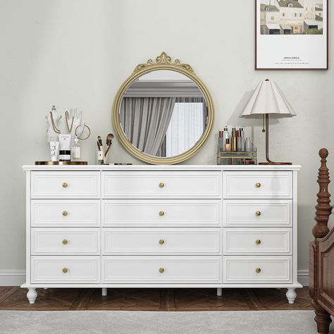 PRICES MAY VARY. [Modern Elegance] Pure white with a sleek modern design, this dresser chest offers a harmonious aesthetic to any living space. Its compact structure and refined texture uphold an elegant atmosphere. [Premium Quality Materials] Crafted from thick MDF panels, sturdy wooden legs effectively support the weight of this 12-drawer dresser, ensuring stability and durability. Golden handles and metal glides enable smooth drawer operation. The surface is polished, wear-resistant, and easy 12 Drawer Dresser, Drawer Closet, Dresser White, Long Dresser, White Chest, 9 Drawer Dresser, White Dresser, White Chests, Classic Bedroom