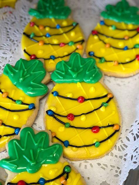 Pineapple Christmas Tree Cookies - Mueller's Bakery Tropical Christmas Desserts, Pineapple Christmas Decorations, Pineapple Decorated Cookies, Christmas In July Cupcakes, Hawaiian Christmas Cookies, Christmas In July Food Ideas, Christmas In July Food, Christmas Luau Party, Christmas In July Cookies