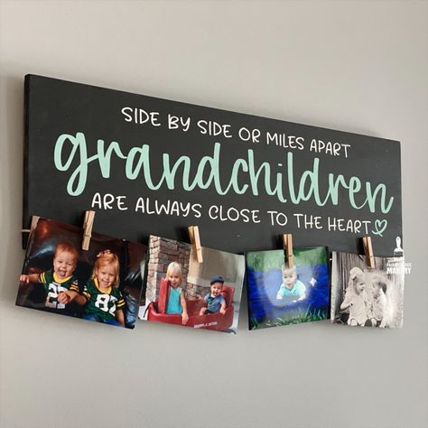 Celebrate the special bond with your grandchildren using our 'Side by Side or Miles Apart, Grandchildren Are Always Close to the Heart' plank design. Perfect for hanging cherished photos, this heartfelt piece adds a warm and loving touch to any space. Whether near or far, this sign beautifully captures the connection that keeps family close, no matter the distance. Cricut Projects For Gamers, Quick And Easy Cricut Projects To Sell, Cheap Cricut Gifts, Homemade Cricut Gifts, Cricut Projects For Grandparents, Grandparent Cricut Gifts, Small Cricut Projects To Sell, Cricut Grandma Gifts, Easy Cricket Projects