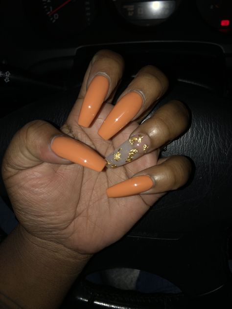 Time for autumn colors.  Coffin shaped burnt orange nails with gold leaf foil design November Nail Ideas Almond, Burnt Orange Gel Nails, Grey And Orange Nails, Fall Color Nails Acrylic, Orange Marble Nails, Nails With Gold Leaf, Orange Fall Nails, Burnt Orange Nails, Nail Options