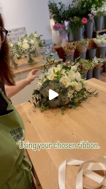 Budding Designs Florist on Instagram: "How to bind a bridal bouquet without using pins.   This method is a fuss free way to bind a bridal and bridesmaids bouquet without the need for tape, glue or pins that is secure and comfortable to hold.   • • #floristtutorial #weddingflowertutorial #howtomakeabouquet #howtofinishabridebouquet #teachfloristry #diyflowers #wrapabridesbouquet #learnatrade #learnaskill #haveago #flowerschool #floristy #floristshop #florist  #barryflorist #floristinbarry #flowersvaleofglamorgan #highstreetflorist  #flowers #allroundflorist  #qualifiedflorist #qualifiedfloristbarry #valeofglamorgan #shoplocalwales" How To Build A Bouquet, Bridesmaids Bouquet, Making A Bouquet, Flower School, Florist Shop, Flower Studio, Flower Diy, White Wedding Flowers, Wedding Diy