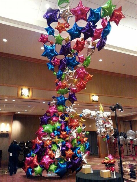 Rock Party Decor Extravagant Balloon Decor, Balloon Window Display, Rock Star Balloon Garland, Balloons Window Display, Balloon Ceiling Decorations, Stars Ceiling, Orbz Balloons Ceiling, Hanging Balloons, Trendy Balloons