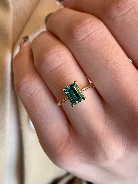 Discover more by clicking here! 😍 Please Re-Pin for later 😍💞 necklaces gift ideas Emarald Green Ring, Colorful Stone Engagement Ring, Emerald Gem Ring, Dark Green Emerald Ring, Square Emerald Engagement Ring, Emerald Green Engagement Ring Gold Band, Emerald Cut Green Engagement Ring, Non Traditional Engagement Rings Emerald, Real Emerald Engagement Ring