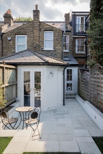 This charming side extension might be small but it certainly packs a punch. By adding a modest amount of new space, we've been able to open up the ground floor and create a quirky, practical space that is ideal for this busy London family. Small Side Return Extension, House Extension Ideas, Side Return Kitchen Extensions, Side Return Extension, Side Extension, Side Return, London Family, Rear Extension, House Extension