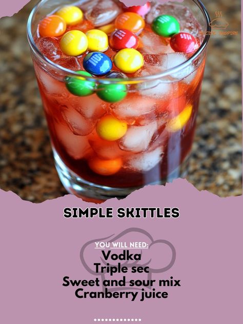 Taste the rainbow in a glass! This fun and fruity cocktail will brighten up any party. 🍹✨ #ColorfulCocktails #FruityFun Simple Skittles Ingredients: Vodka (1 oz) Triple sec (1 oz) Sweet and sour mix (1 oz) Cranberry juice (1 oz) Sprite (1 splash) Skittles candy (for garnish) Ice cubes (as needed) Instructions: Mix vodka, triple sec, sweet and sour mix, and cranberry juice in a shaker with ice. Shake and strain into a glass. Top with a splash of Sprite and garnish with Skittles. 🌈🍭 This Si... Skittles Cocktail, Skittle Vodka, Classy Drinks, Skittles Candy, Bartender Drinks Recipes, Fruity Cocktail, Bartender Drinks, Pretty Alcoholic Drinks, Yummy Alcoholic Drinks