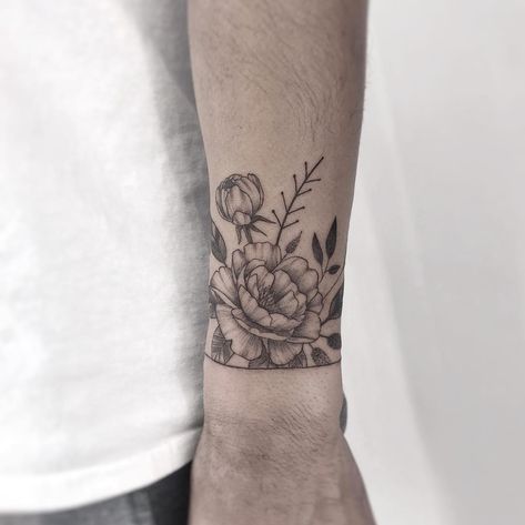 Peony / Floral wrist band tattoo. Black and grey, detailed, fineline, microrealism tattoo. Flower Wristband Tattoo, Floral Wrist Band Tattoo, Floral Wrist Tattoo, Wrist Band Tattoo, Flowers Tattoos, Forearm Flower Tattoo, Cuff Tattoo, Forearm Band Tattoos, Flower Wrist Tattoos