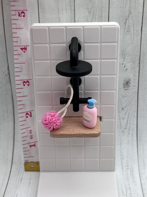 Transform your dollhouse bathroom with this charming miniature bathroom shower set!  Perfect for adding a touch of realism to your dollhouse or diorama! This set includes a tiny shower with add on accessories a miniature shampoo bottle and adorable mini loofah.  Perfect for modern dollhouse enthusiasts or a lover of tiny things. A creative way for anyone looking to add a touch of whimsy to their miniature world. Miniature Bathroom, Dollhouse Bathroom, Calico Critter, Miniature World, Love Heart Images, Mini Doll House, Dollhouse Ideas, New Bedford, Modern Dollhouse