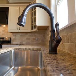 Oil Rubbed Bronze faucet with undermount stainless sink . . . these look good together! Oil Rubbed Bronze Kitchen Faucet, Oil Rubbed Bronze Kitchen, Rubbed Bronze Kitchen, Contemporary Powder Room, Bronze Kitchen Faucet, Kitchen Faucet Design, Oil Rubbed Bronze Faucet, Replacing Kitchen Countertops, Bronze Kitchen