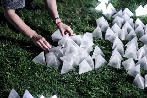 Pangenerator's installation of translucent pyramids flashes in waves of light