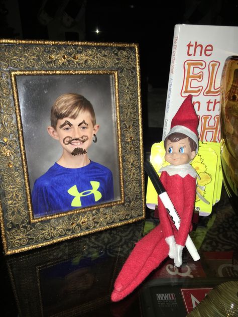 Elf drawing on School picture Elf On The Shelf Drawing On Pictures, Elf On The Shelf Skittles, Drawing On Pictures, Elf 2023, Elf Drawing, Elf Stuff, Elf Idea, Elf Drawings, Elf Magic