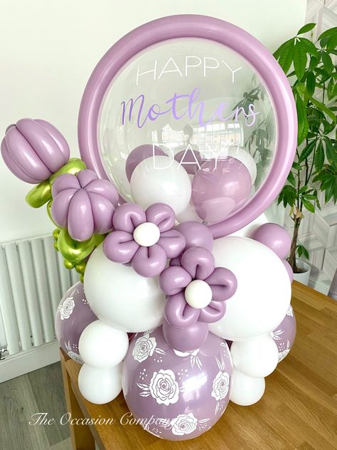 🌸Lovely Balloon Arrangement for Mothers Day 🌸 Balloons Used Bobo Balloon Sempertex White Sempertex Pastel Dusk #mothersday #mothersdaygifts #mothersdaygiftideas #mothersdayballoons #balloonarrangement #balloondisplay #balloondecor #balloongift #balloonart #balloontulip #balloonflowers #balloonideas #ballooninspo #sempertex #mums #giftsformom #giftsforher #personalisedballoons #boboballoon #prettyballoons #purpleballoons Gift Balloon Ideas, Mother Day Balloons Ideas, How To Make A Flower Balloon, Balloon Hugs, Mothers Day Balloons Bouquets, Mothers Day Stuffed Balloon Ideas, Balloon Bouquet Mothers Day, Mother’s Day Balloon Back Drop, Mother’s Day Balloons