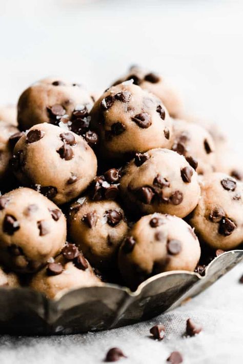 no bake cookie dough bites - Blue Bowl No Bake Cookie Dough Bites, Eggless Cookie Dough Recipe, Edible Cookie Dough Bites, Edible Chocolate Chip Cookie Dough, Chocolate Chip Cookie Dough Bites, Eggless Cookie Dough, Chocolate Chip Cookie Cups, No Bake Cookie, Eggless Chocolate Chip Cookies