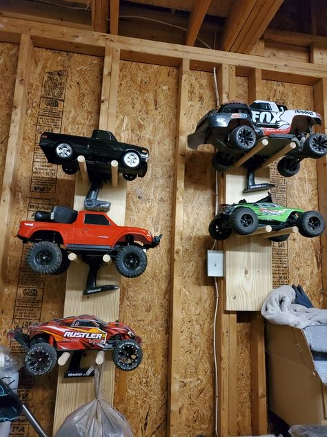 Rc Car Storage Ideas, Car Storage Ideas, Monster Truck Storage Ideas, Monster Jam Truck Storage, Monster Truck Organization Boy Rooms, Monster Jam Toy Storage, Monster Truck Wall Storage, Crawler Course, Rc Crawler Course