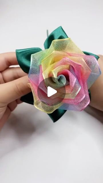 Itsy Bitsy Artsy I Art & Craft I Creative DIY on Instagram: "Fold or twist ribbons and make  beautiful roses quickly🌹✂️ Easy and creative crafting idea. You can use these ribbon roses in different ways like decor, dress designs, hair clips and so on.  . . ➡️ @itsy_bitsy_23 ➡️ @itsy_bitsy_23 ➡️ @itsy_bitsy_23 . . #DIYCrafts #handmadediy #ribboncraft #handcraftedroses #ribboncrafting #rosecraft #CraftyKids #HandmadeGifts #parentchildcrafts #creativecraft #CraftingMagic #kindergartencrafts #simplecraft #funwithcraft #ArtfulKids #CraftyCreators #HeartfeltCrafts #KidFriendlyDIY #ArtisticAdventures #HandmadeHappiness #creativecrafting #decorideas #creativemom #CraftyGifts #giftdecoration #diygift #DIYProjects #ribbonroses #ArtisticCreations" How To Make Ribbon Roses, Ribbon Flowers Diy Easy, Diy Ribbon Roses, Making Roses, Rolled Fabric Flowers, Ribbon Flowers Diy, Twisted Ribbons, Rose Crafts, Creative Mom