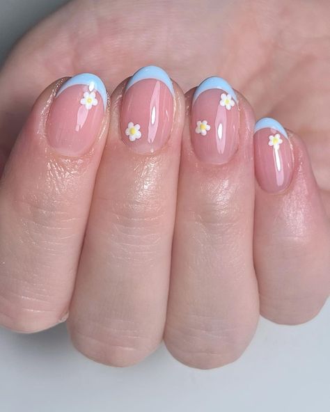 Introducing our 2024 Spring Collection. Discover a range of gel polishes in delicate pastels, each inspired by spring's blossoming flowers. These colors are designed to resonate with your sense of style and grace, bringing the essence of spring right to your fingertips. 
[Credit: elbebeauty on Instagram]
french nails, spring nails, simple nail designs, short nails, floral nails, blue nails, oval nails Portugal Inspired Nails, Short Floral Nails, Simple Summer Nail Ideas, Oval Nails Designs, Gel Nails French, Simple Spring Nails, Summer Nail Ideas, Hello Nails, Short Gel Nails