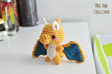 Dragonite pokemon by MissBajoCollection Dragonite Pokemon, Crochet Dragons, Pokemon Heart, Baby Hats Pattern, Pokemon Crochet, Pokemon Crochet Pattern, Crochet Project Free, Knitting Quotes, Pokemon Dolls