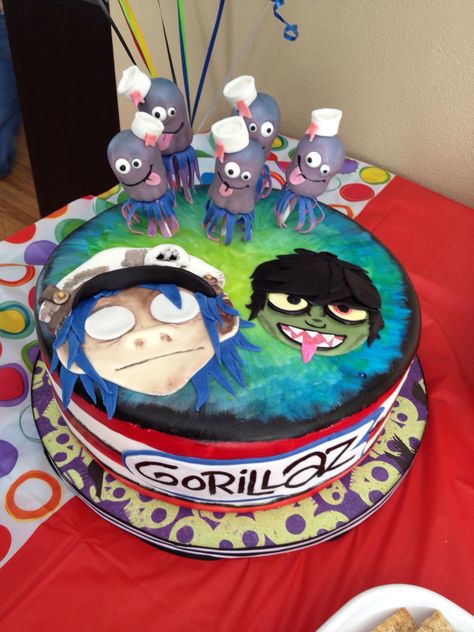 Gorillaz birthday cake with superfun jellyfish cakepops www.shophappybaker.com Gorillaz Birthday Party, Gorillaz Birthday Cake, Spidey Birthday, Noodle Gorillaz, Gorillaz 2 D, Anime Canvas Painting, Gorillaz Art, Carnival Themes, Dream Cake