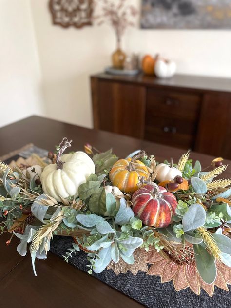 This Centerpieces item by AllSeasonsHouseDecor has 5 favorites from Etsy shoppers. Ships from Malverne, NY. Listed on Aug 26, 2024 Centerpiece For Dining Table, Dough Bowl Centerpiece, Autumn Berries, Farmhouse Thanksgiving, Elegant Farmhouse, Fall Table Centerpieces, Harvest Decor, Faux Pumpkins, Dining Table Centerpiece