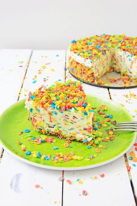 Looking for a unique twist on a classic cheesecake recipe? Wait until you try this one. This is a Fruity Pebbles Cheesecake. #MyHeavenlyRecipes #Cheesecake #dessert Fruity Pebbles Cheesecake, Fruity Pebble Cheesecake, Fruit Cheesecake, Fruity Pebbles Cereal, Pebbles Cereal, Heavenly Recipes, Cereal Dessert, Cheesecake Recipes Classic, Fruity Treats